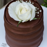 Triple Chocolate Cake With White Rose